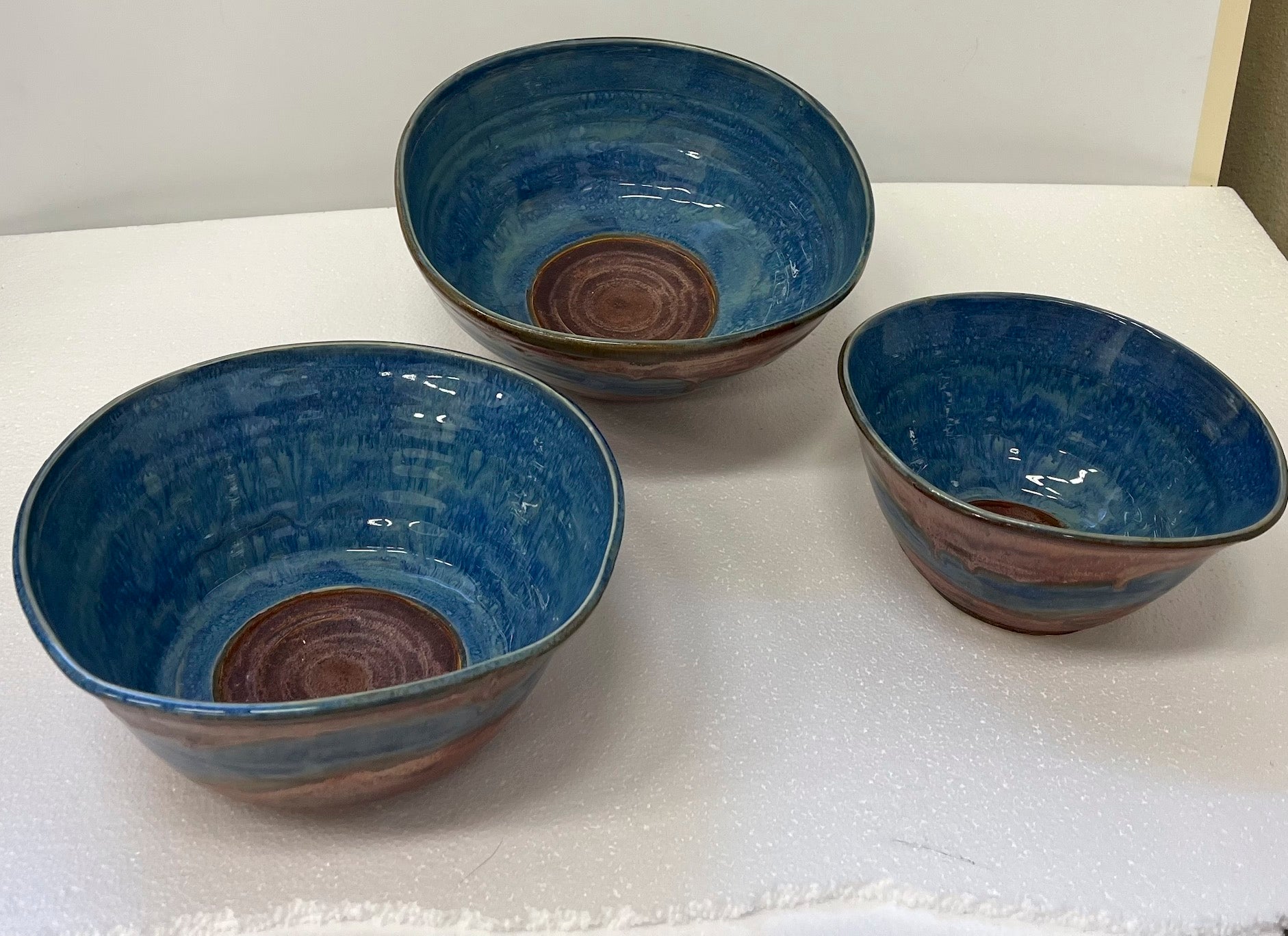 3 stacked bowls blue copper