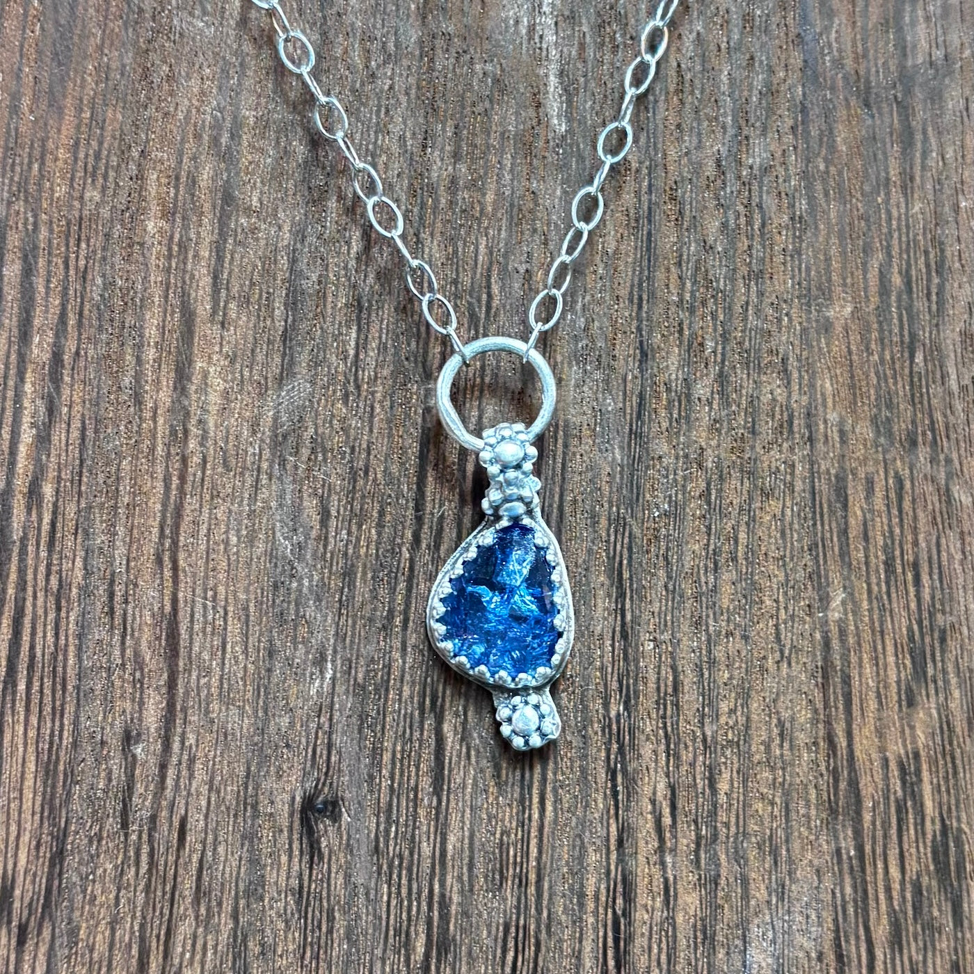 Aurora Violet Faceted Tanzanite And Silver Pendant