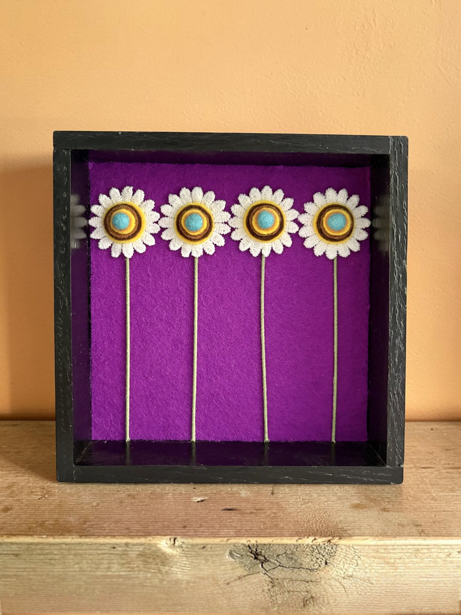 Black Frame with 4 Daisies