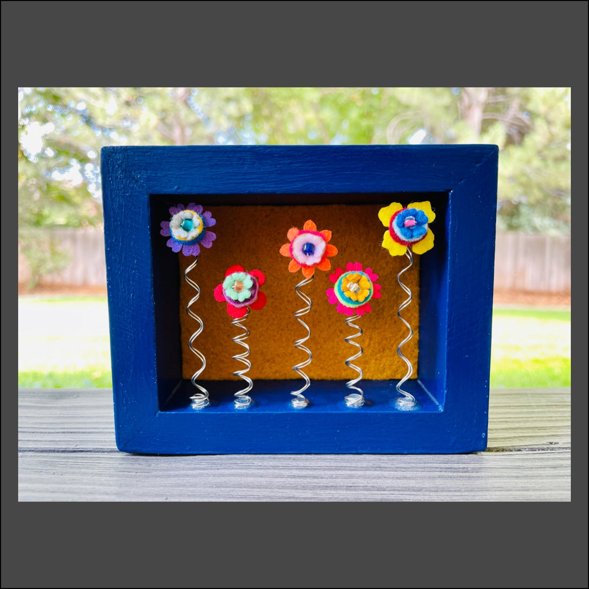 Blue Frame with 5 Multi Colored Flowers