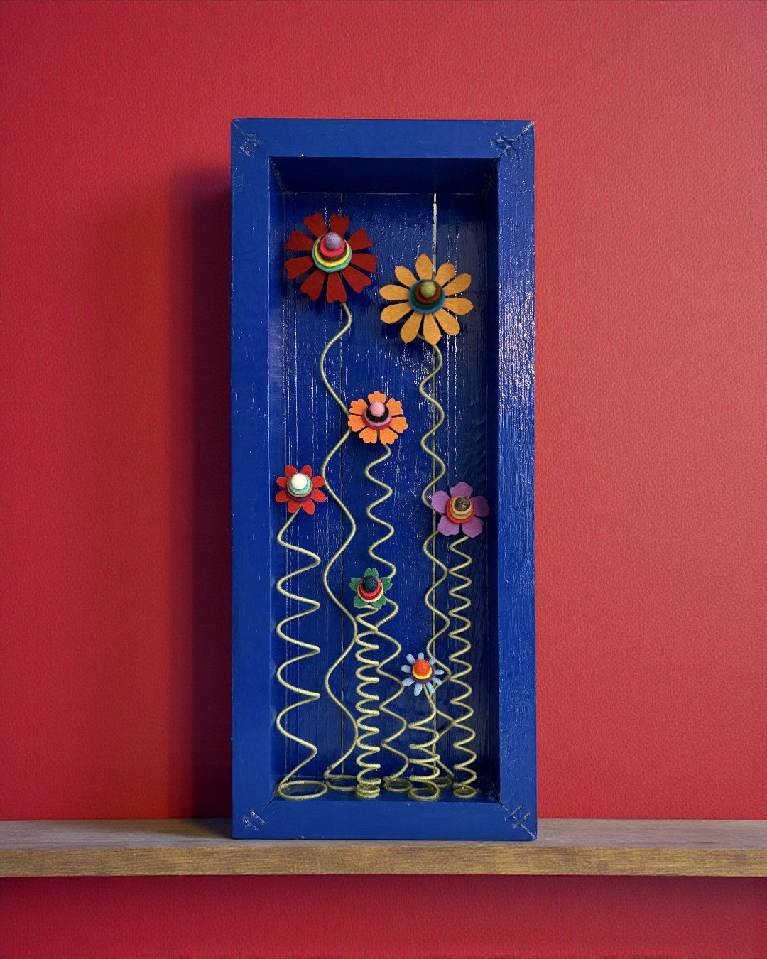 Blue Frame with 7 Multi Colored Flowers