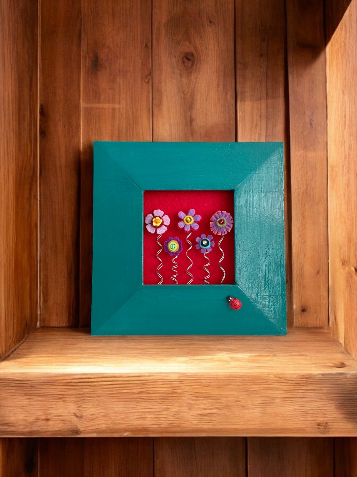 Blue Frame with Purple Felt Flowers