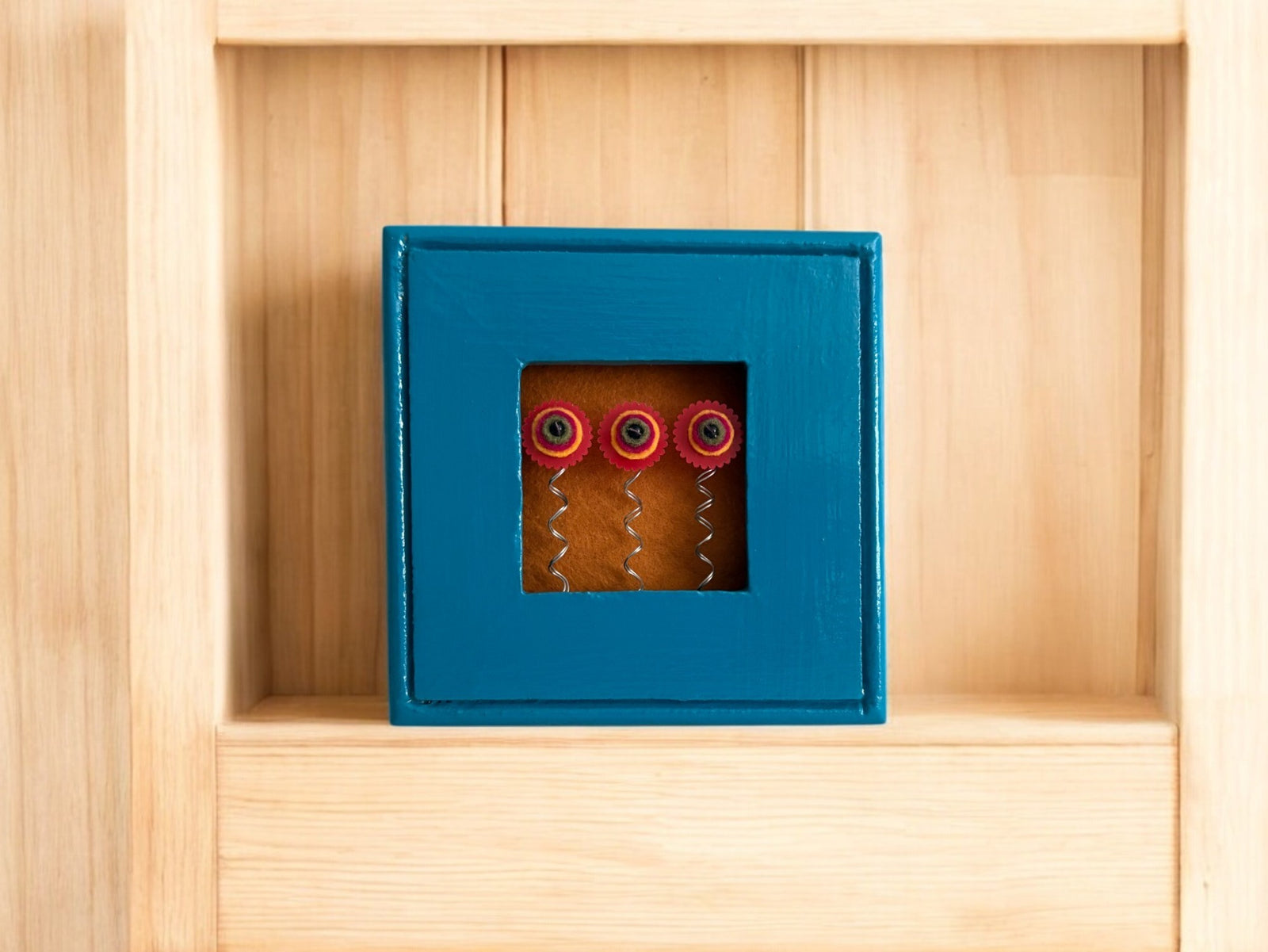 Blue Square Frame with 3 Red Flowers