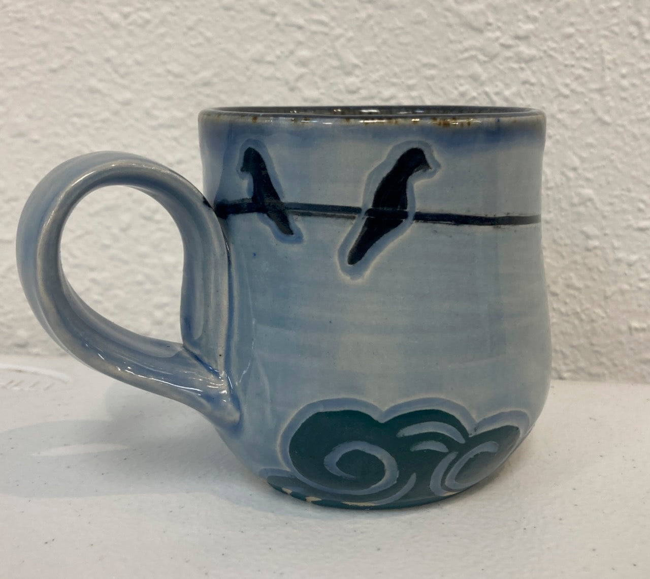 Ceramic mug_Skies_birds clouds