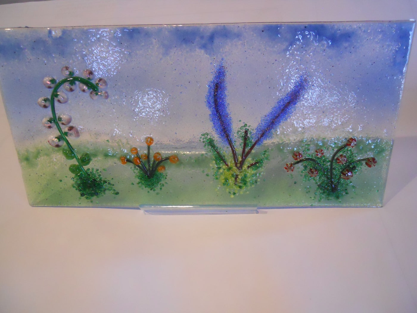 Glass Flowering meadow with sparkling flowers
