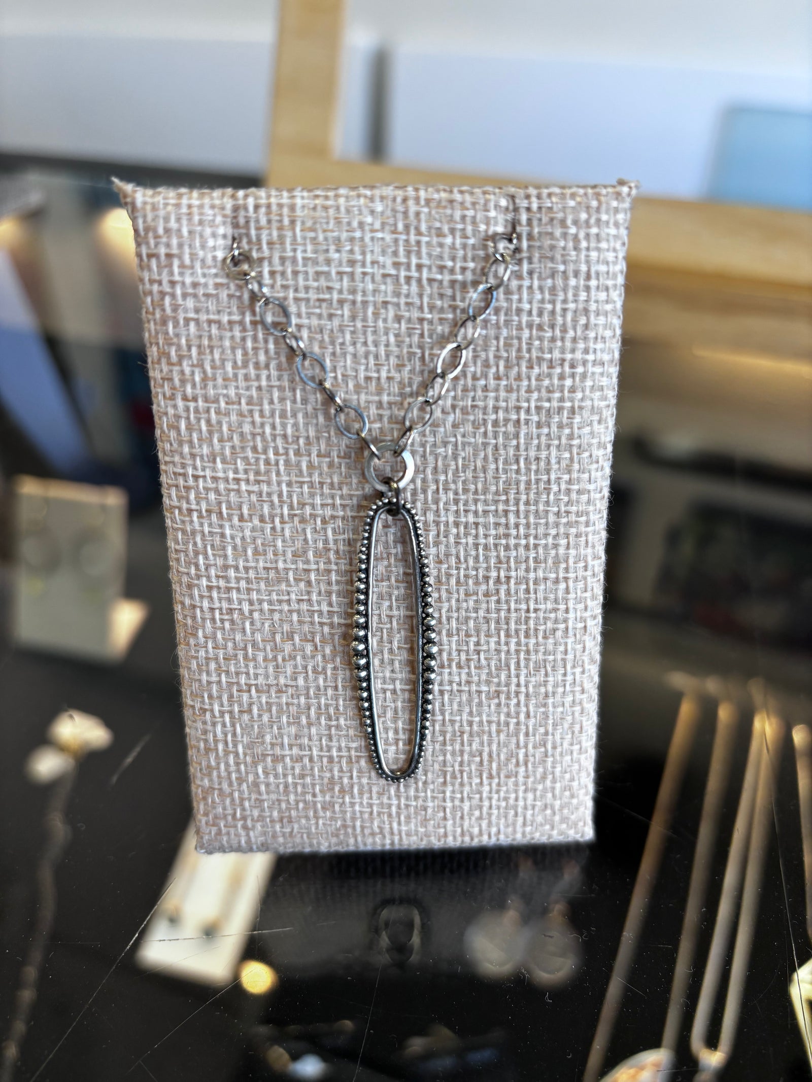 Oval Sterling Silver Dot Detail Pendant