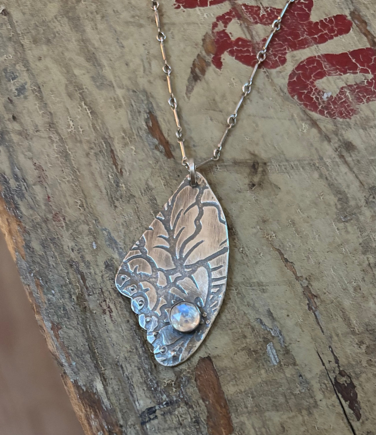 Moonstone and Sterling patterned wing pendant  N40