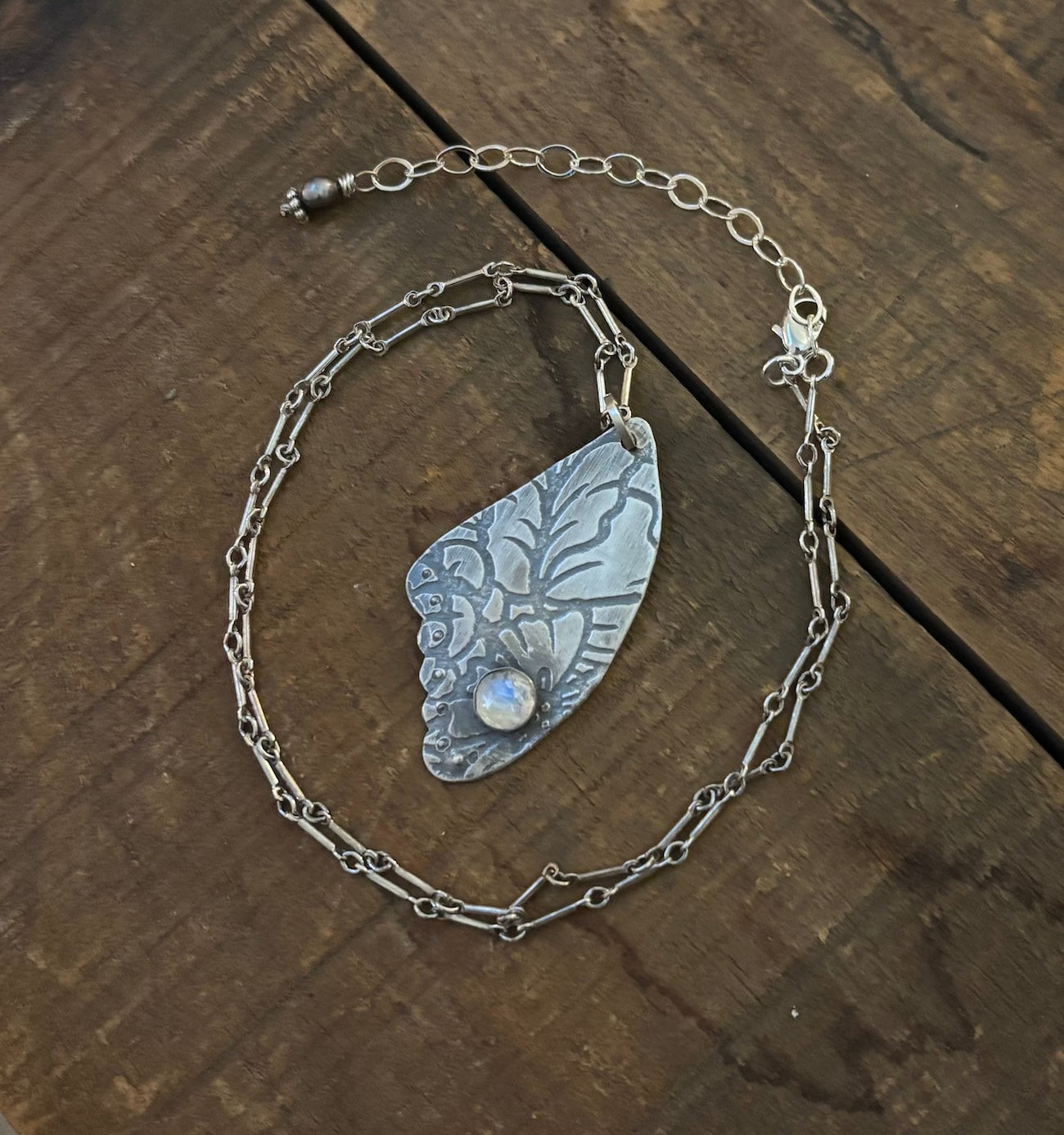 Moonstone and Sterling patterned wing pendant  N40