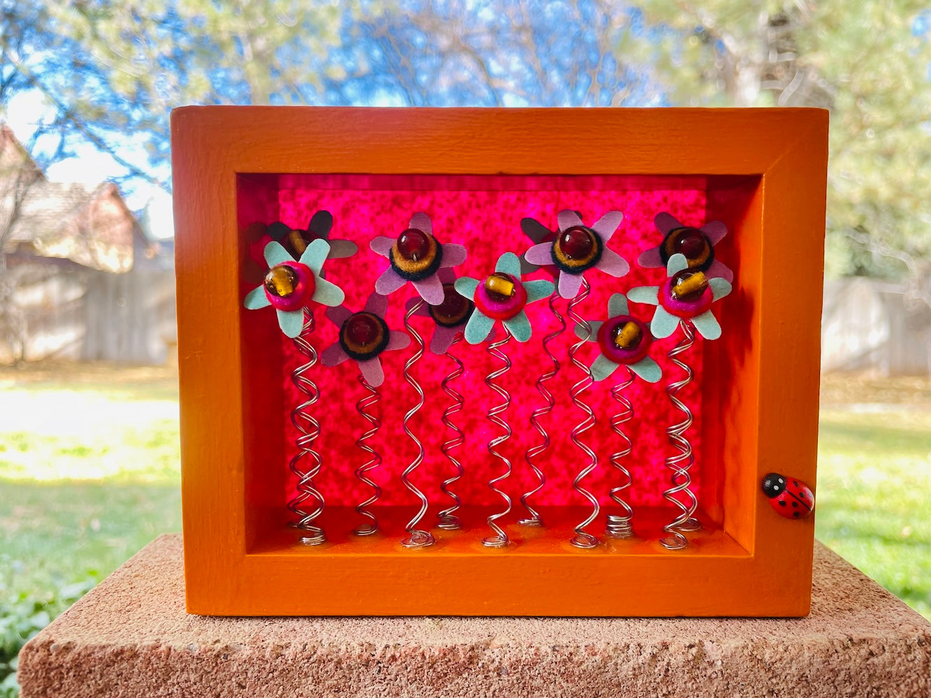 Orange Shadow Box with Purple and Blue Felt Flowers