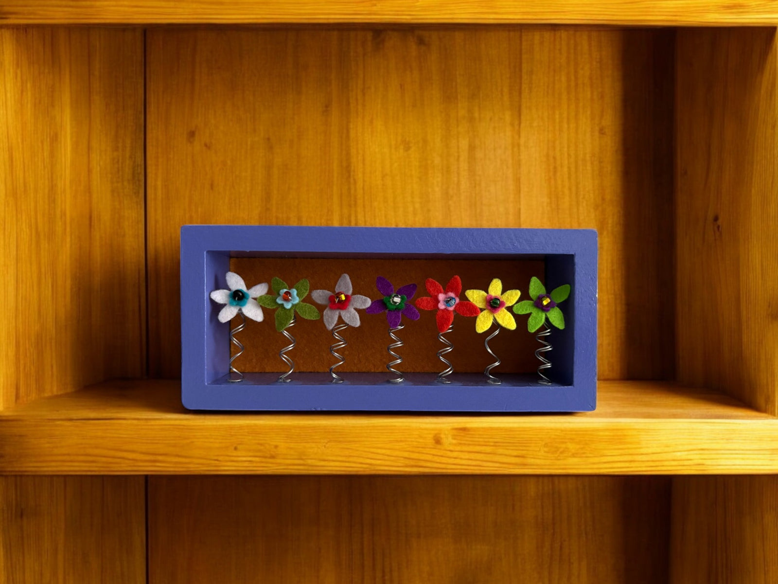Purple Shadow Box Frame with 7 Multi Colored Flowers