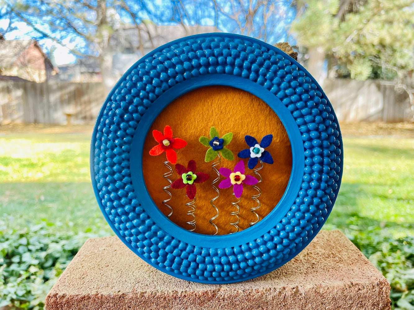 Round Bright Blue Frame with Multi-Colored Felt Flowers