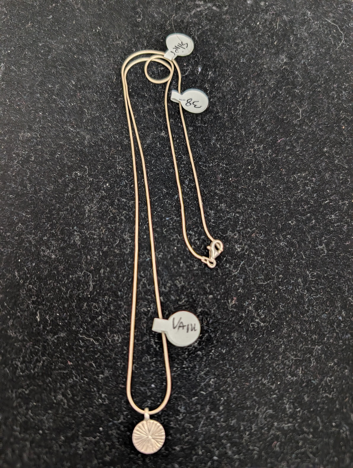 Silver chain with Thai pendant