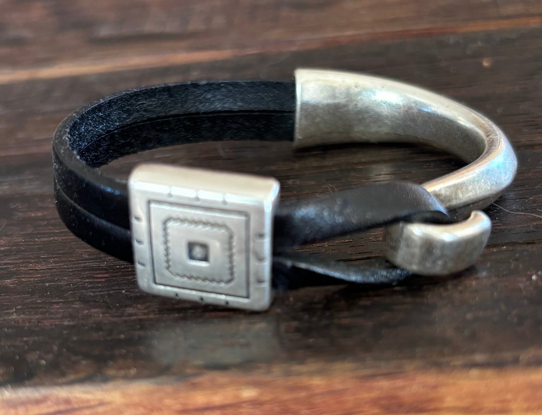 Cuff with Silver square on black leather size 6 1/2