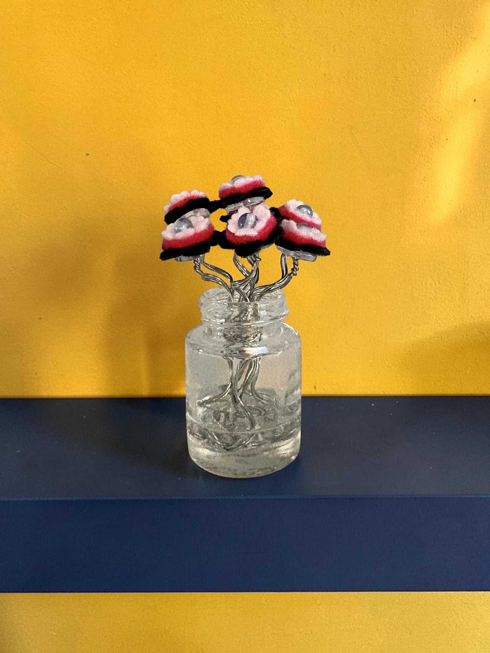 Small Vase with 7 Pink and Black Flowers