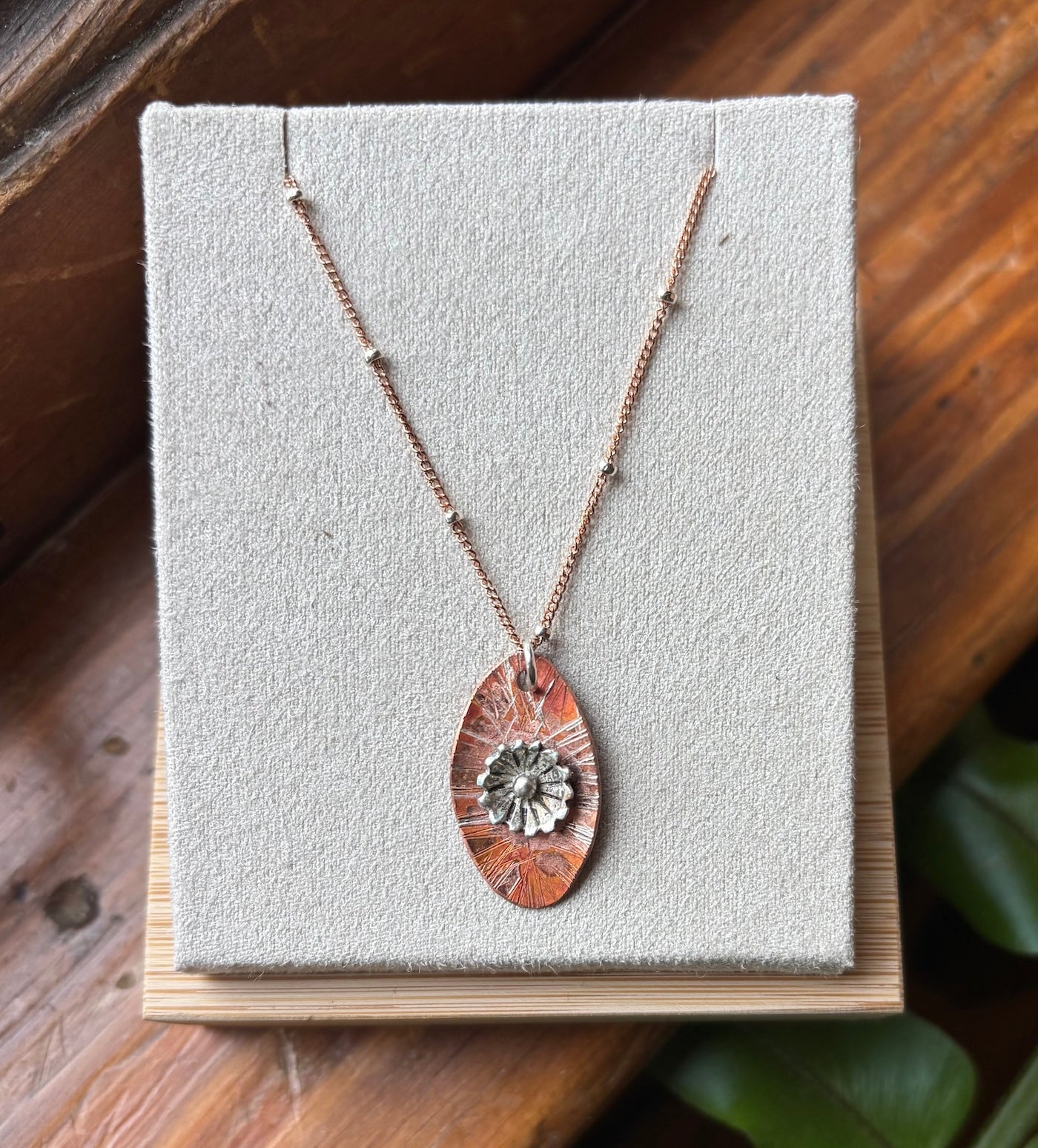 Sterling Flower on textured copper pendant N37