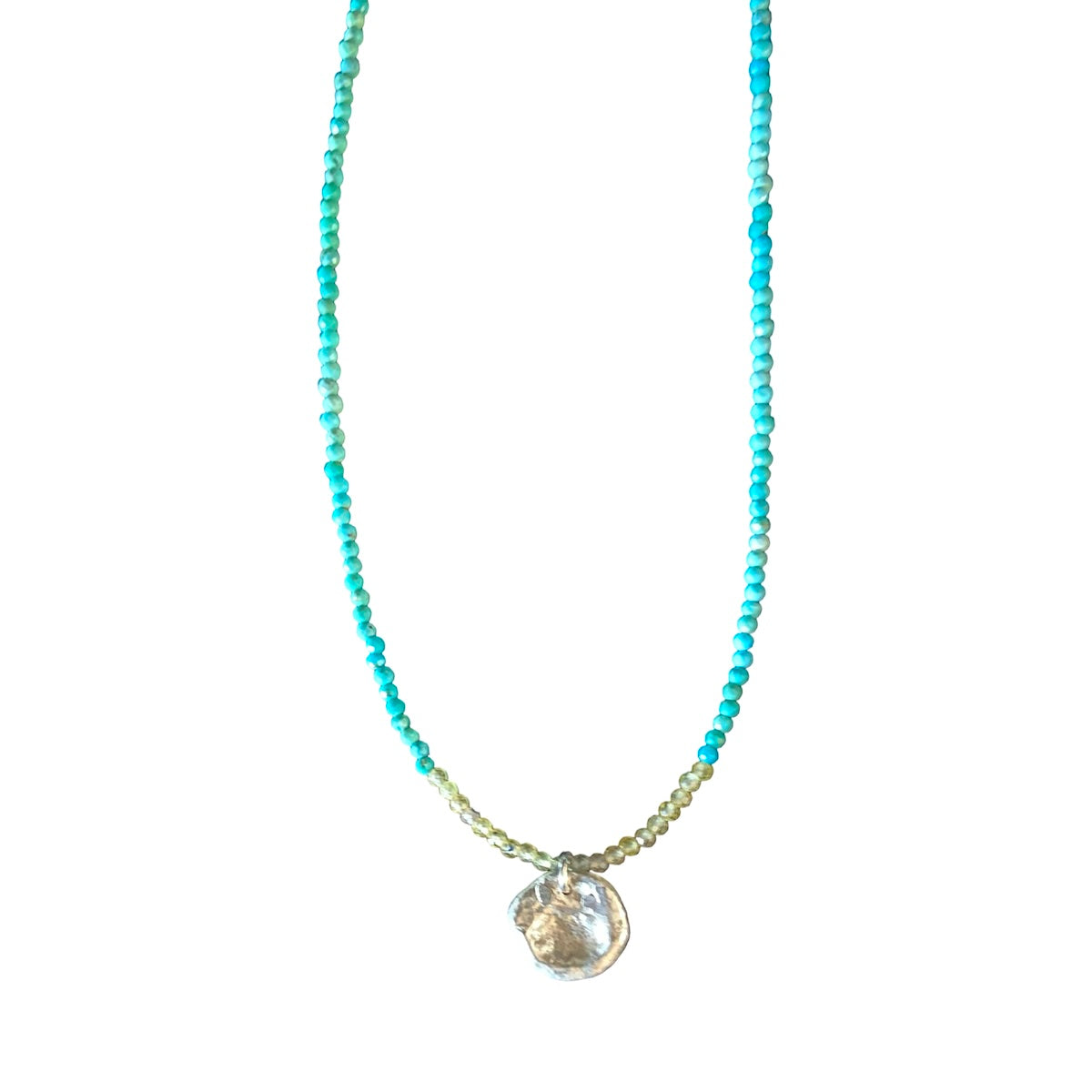 Turquoise and silver water cast pendant