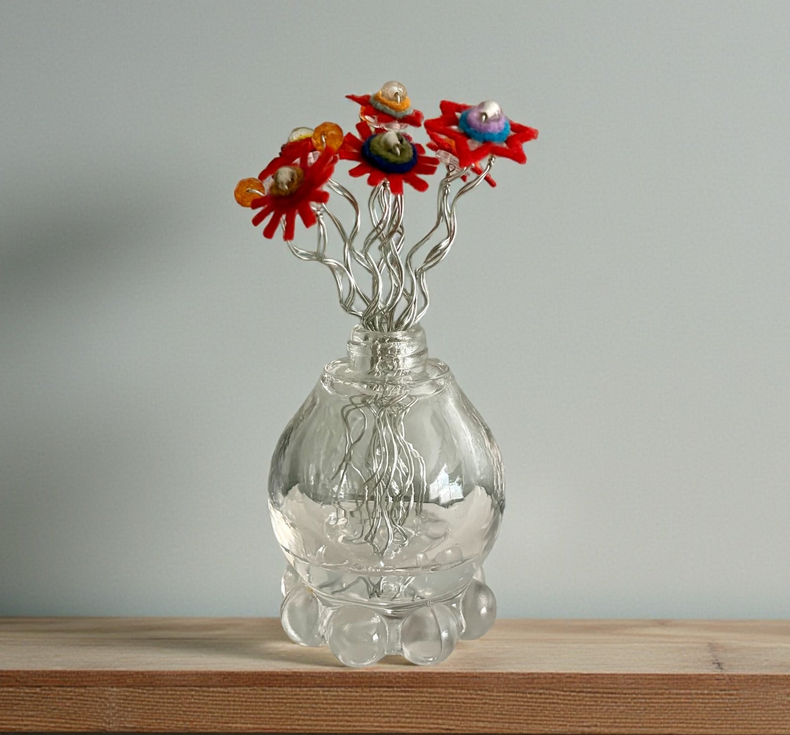 Vase with Red Flowers and Orange Beads