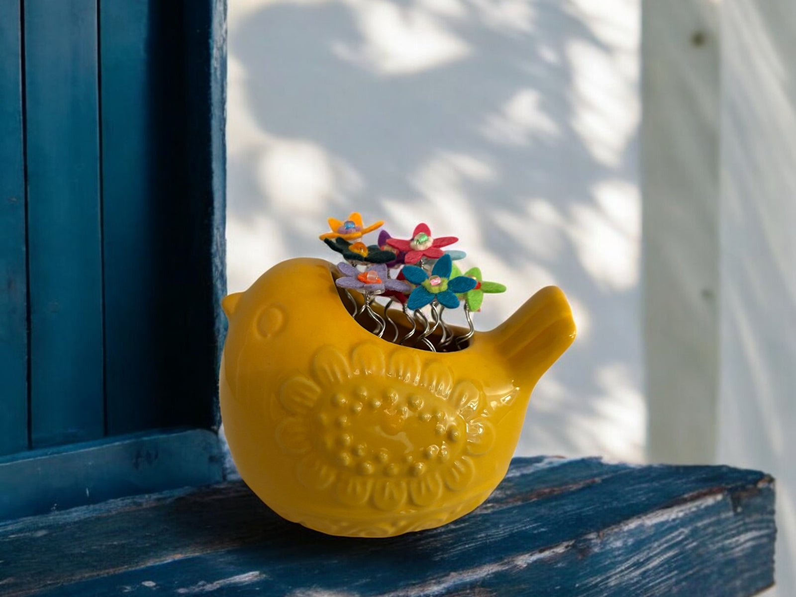 Yellow Bird with Multi Colored Flowers