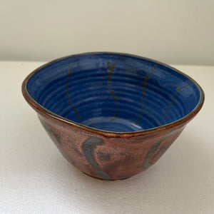 Ribbons of blue and copper-bowls