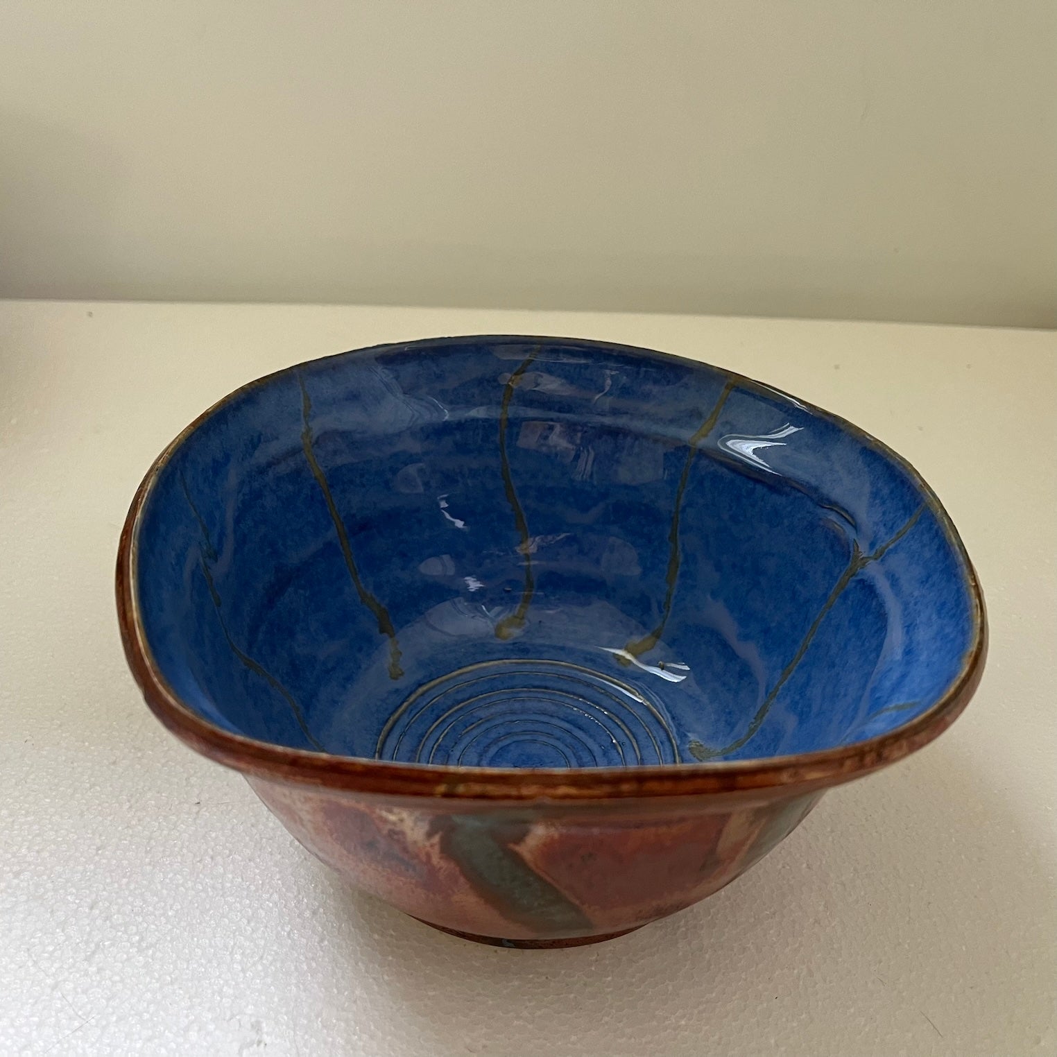 Ribbons of blue and copper-bowls