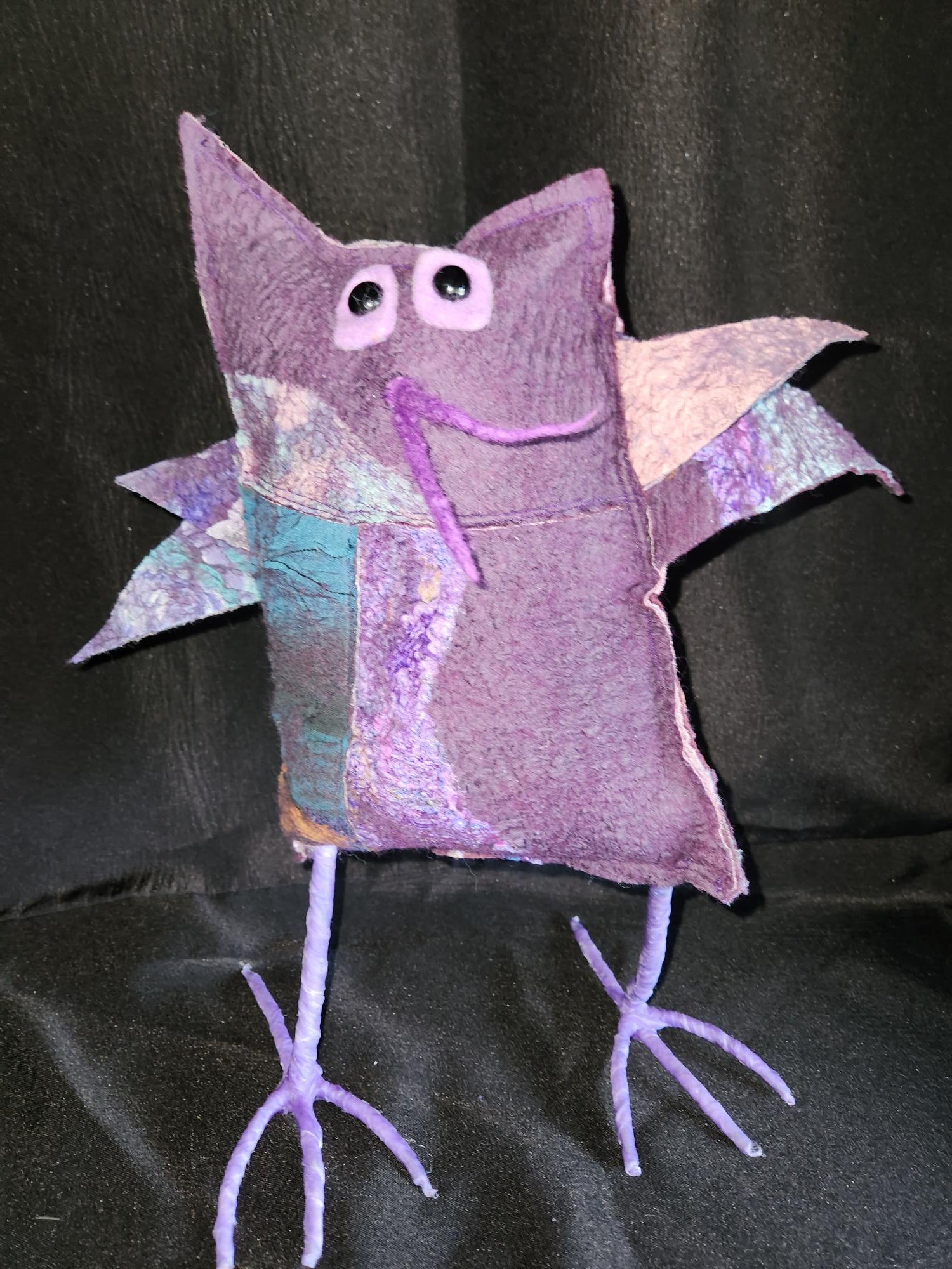 Purple Bird with spike beak