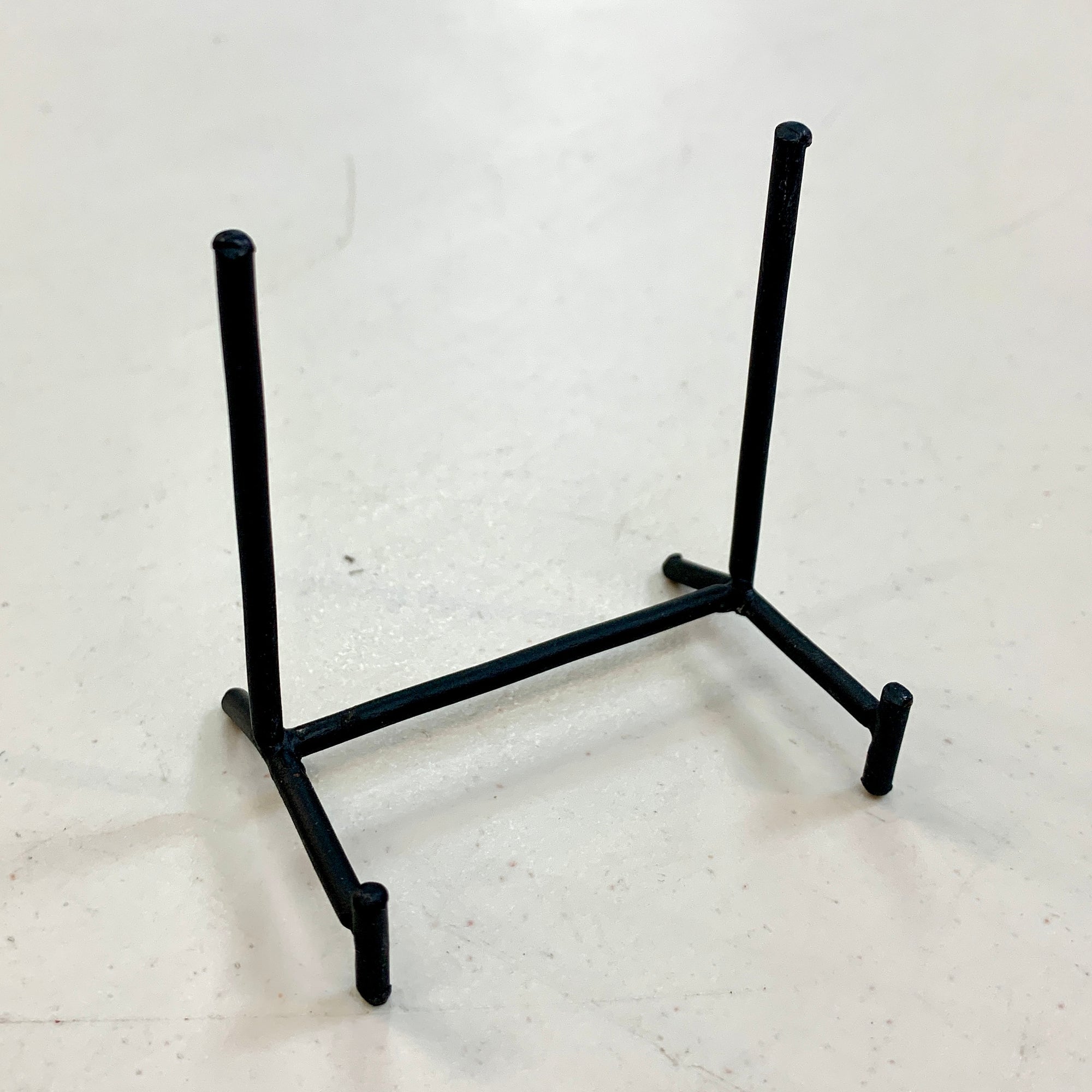 small wrought iron display stand